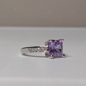 Size 8.25 Silver Tone Ring With Purple Stone